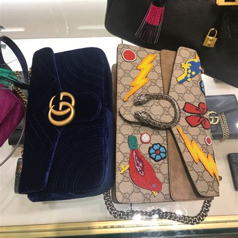 Gucci vs Prada handbags